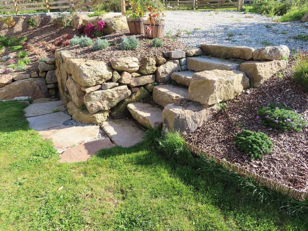 Granite steps leading to barn conversion