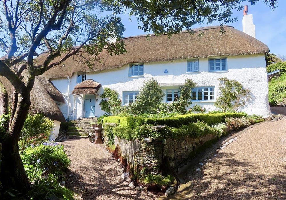 heritage management plans,sixteenth century thatched cottage,devon,reed thatch,lime renders,scantle slate,sash window joinery,ornate ironwork