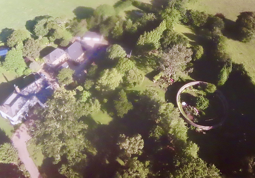 historic garden restoration Devon,listed building architects UK,17th century kitchen garden,thatched wall coping,heritage architecture South Hams,Atkinson Architects projects,Alleron House,Loddiswell,Circular Walled Garden,leat